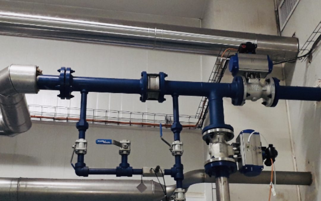 A blue pipe system with valves and pipes.